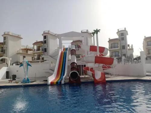 фото Lovely & Luxury 2 bedroom apartment with Swimming and water aqua park view in Sharm Hills luxury resort in Sharm El Sheikh - Red sea