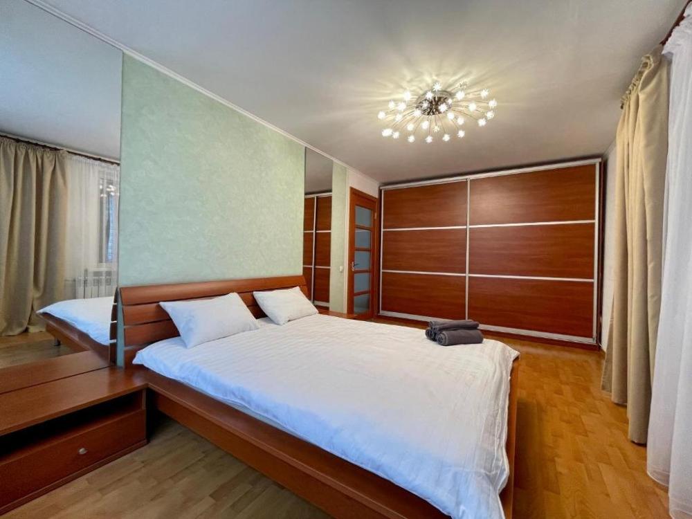 фото Букетова 65 2-комн квартира с гостиничным сервисом с белым постельным